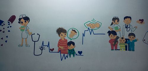 vẽ tranh tường trường tiểu học